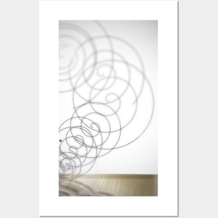 Modern spinning spiral on a wooden table Posters and Art